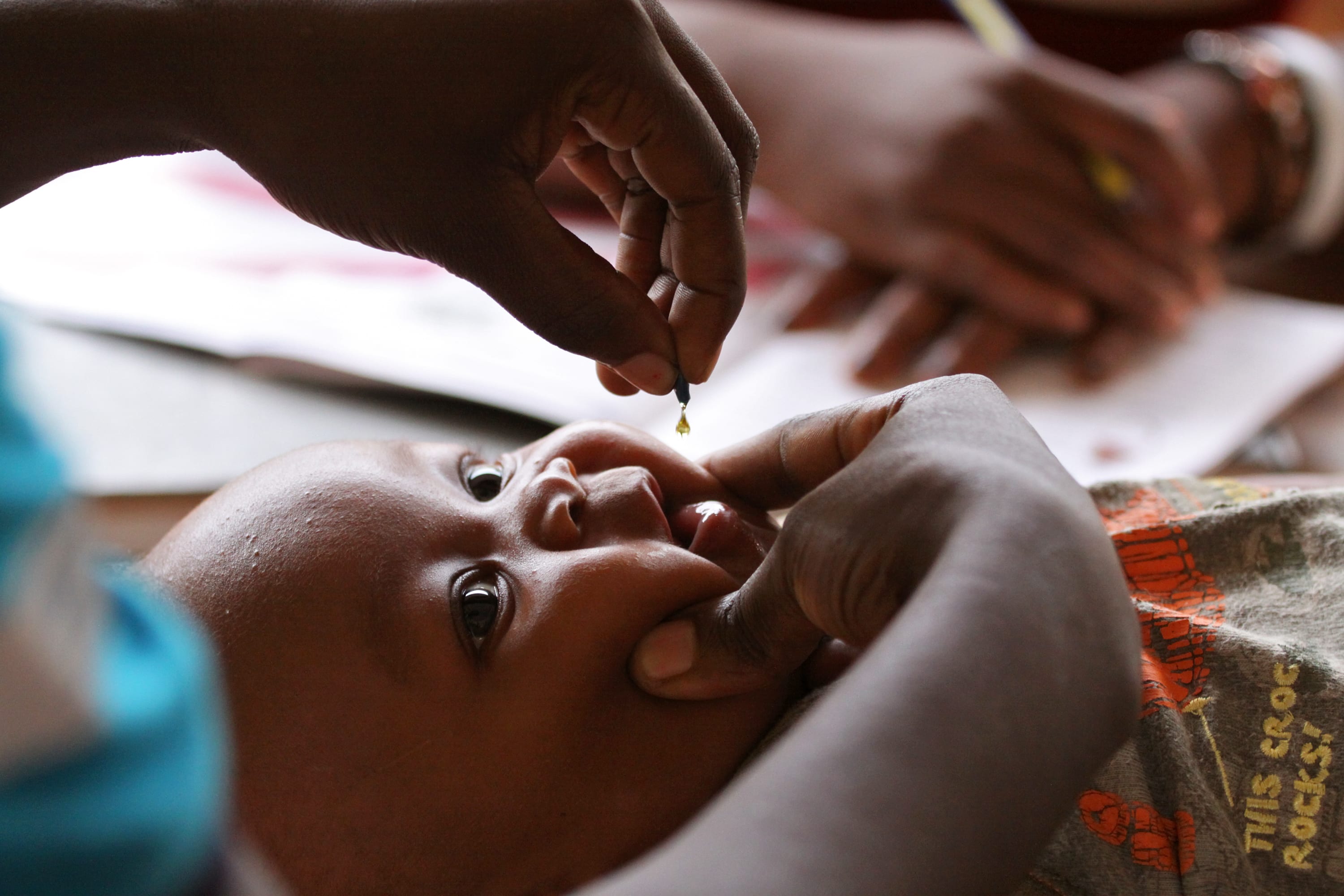 Ganze sub-county, Kenya - Samson Salo, 4-months, receives a dose of vitamin A